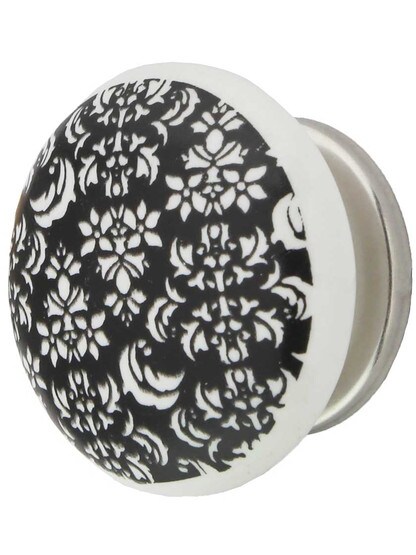 White Porcelain Floral Cabinet Knob with Brass Base in Polished Nickel.